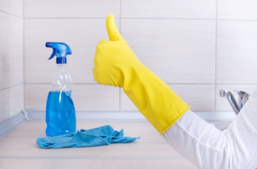 After builders cleaning team removing fine dust from a renovated Hampstead property