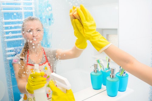 Local cleaning team working in a Hampstead apartment with care